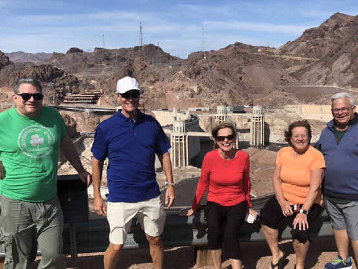 a group of people posing for the camera