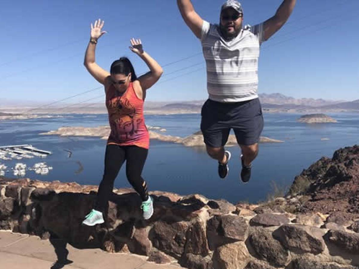 a person standing on a rocky beach